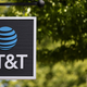 AT&T sign hangs from a pole.